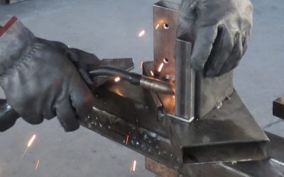 worker welding metal